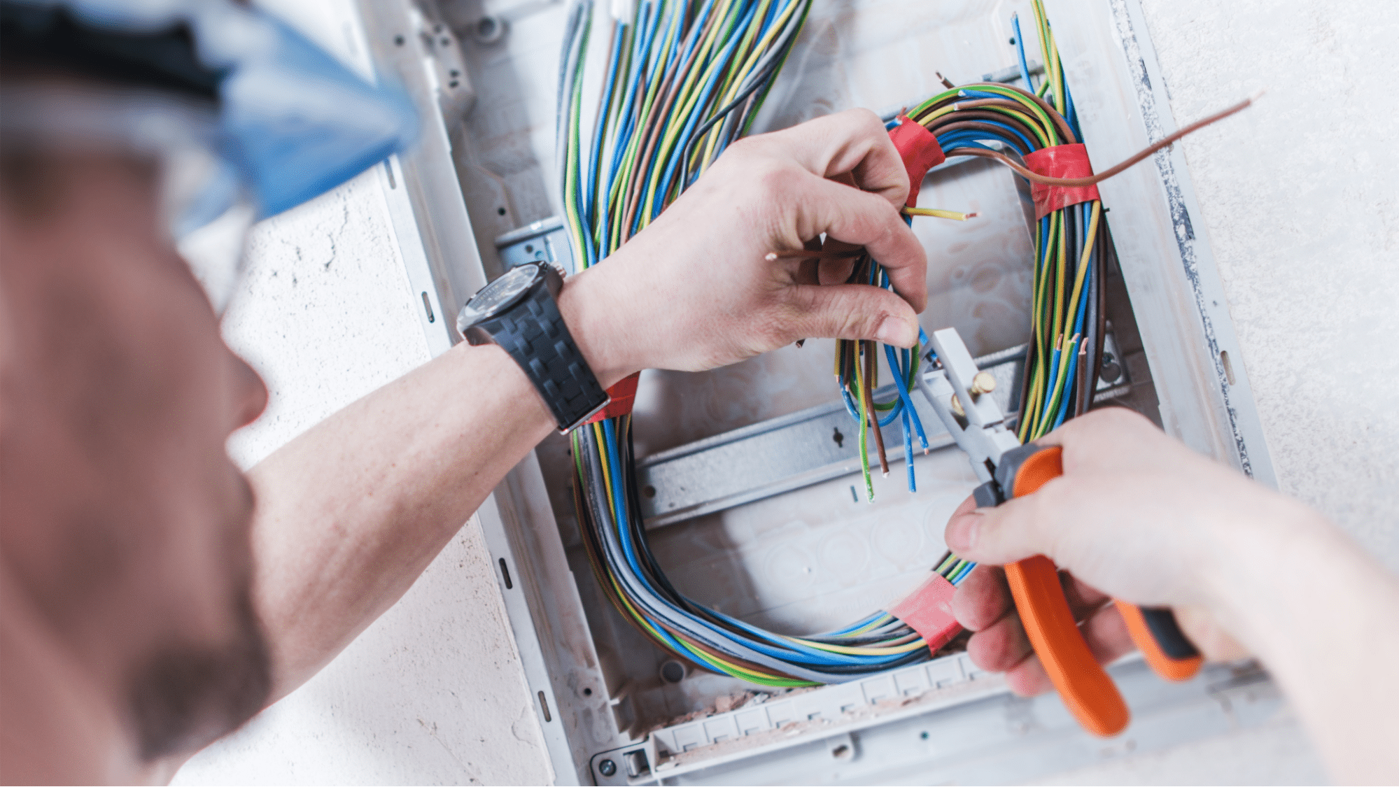 Electrician cutting wires